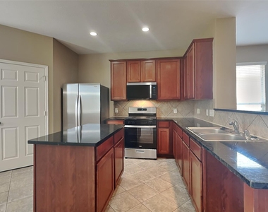 7418 Jacobs Well Drive - Photo Thumbnail 1