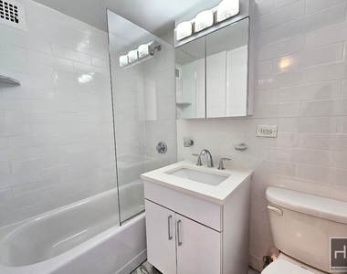 E 16 St - Photo Thumbnail 2