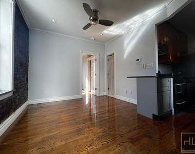 E 13th St. - Photo Thumbnail 1