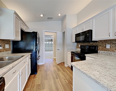 3366 Mahogany Pointe Loop - Photo Thumbnail 4