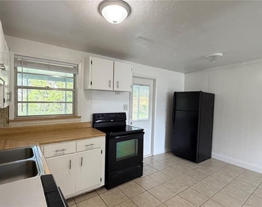 8574 94th Avenue - Photo Thumbnail 3
