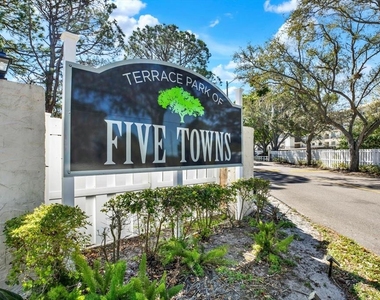 8186 Terrace Garden Drive N - Photo Thumbnail 4