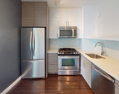 401 E 34th St - Photo Thumbnail 1