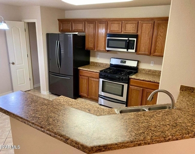 7334 Prickley Pear Drive - Photo Thumbnail 6