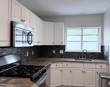 3409 Whitney Avenue - Photo Thumbnail 1