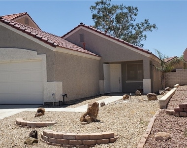 8909 Colorful Pines Avenue - Photo Thumbnail 1