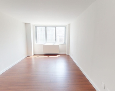 401 E 34th St - Photo Thumbnail 1