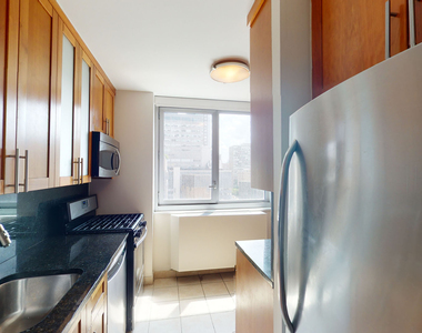 401 E 34th St - Photo Thumbnail 2