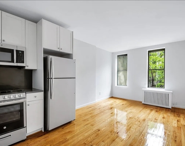 West 49th St & 10th Ave - Photo Thumbnail 1