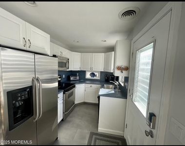 23 E Surf Way - Photo Thumbnail 7
