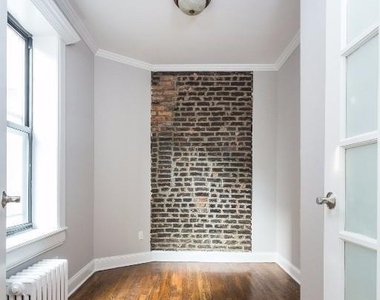 E 13th St. - Photo Thumbnail 4