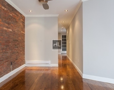 W 103rd St. - Photo Thumbnail 1