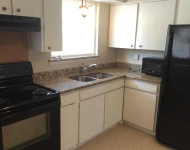 1201 Travis Street - Photo Thumbnail 1