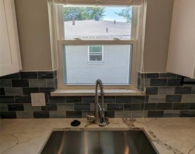 10008 Olmos Drive - Photo Thumbnail 1