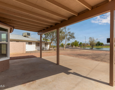 11437 W Lakeshore Drive - Photo Thumbnail 1