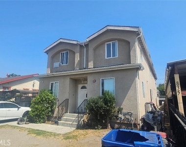 833 E 80th - Photo Thumbnail 1