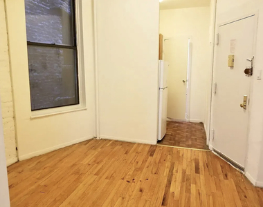 230 E 25th Street - Photo Thumbnail 1