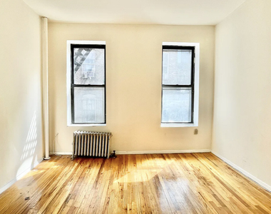 230 E 25th Street - Photo Thumbnail 3