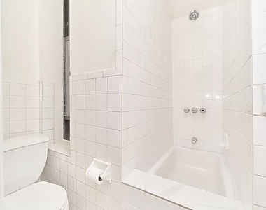 230 E 25th Street - Photo Thumbnail 4