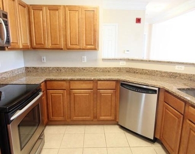 1550 Spring Gate Drive - Photo Thumbnail 5