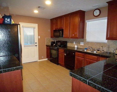 10838 Windfern Lakes Street - Photo Thumbnail 2