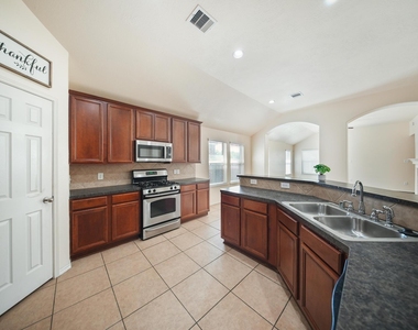 5015 Bridgecrossing Court - Photo Thumbnail 4