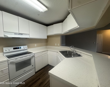7667 N Wickham Road - Photo Thumbnail 4