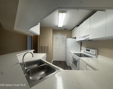 7667 N Wickham Road - Photo Thumbnail 7