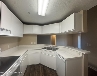 7667 N Wickham Road - Photo Thumbnail 5