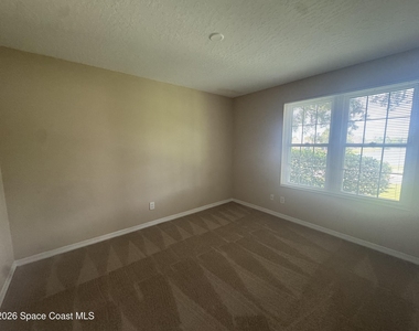 7667 N Wickham Road - Photo Thumbnail 8
