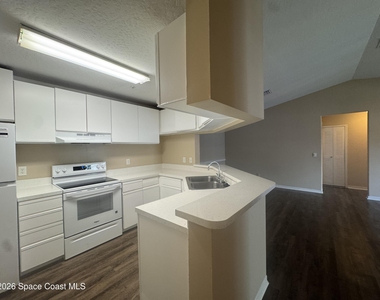 7667 N Wickham Road - Photo Thumbnail 6
