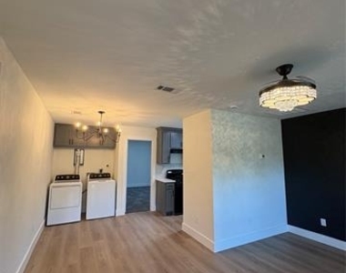3927 Malcolm X Blvd - Photo Thumbnail 2