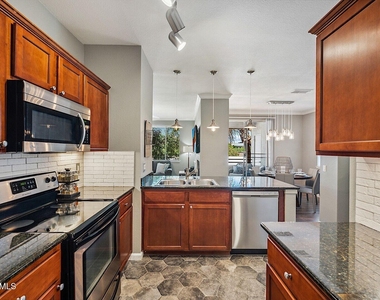 7009 E Acoma Drive - Photo Thumbnail 2