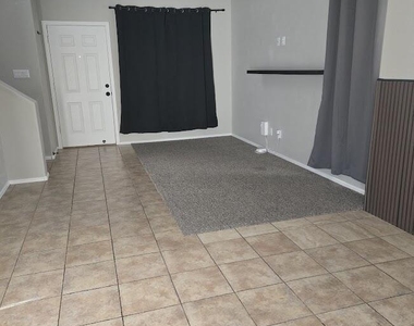1313 E 9th Place - Photo Thumbnail 2