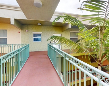 1610 Presidential Way - Photo Thumbnail 1