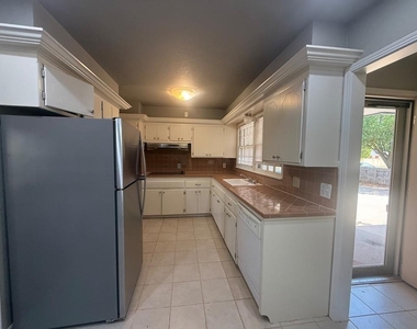 9909 Sunnymeade Place - Photo Thumbnail 5