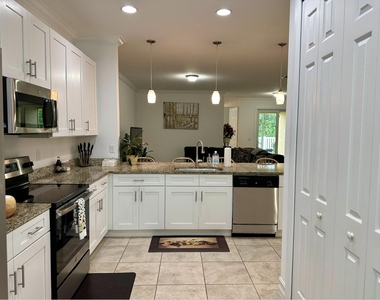 6112 Nw Cullen Way - Photo Thumbnail 3