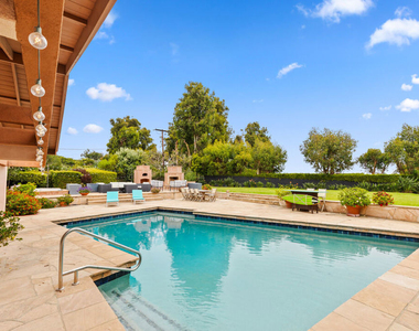 7122 Dume Drive - Photo Thumbnail 1