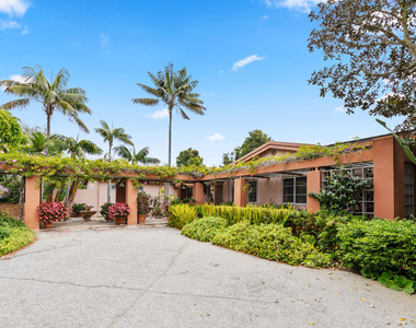 7122 Dume Drive - Photo Thumbnail 4