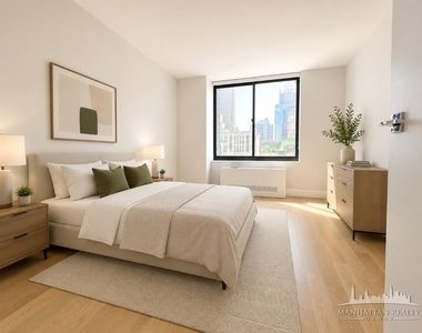 W 48th St - Photo Thumbnail 2