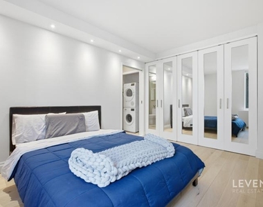 220 E 65th Street - Photo Thumbnail 4