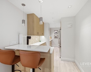 220 E 65th Street - Photo Thumbnail 2