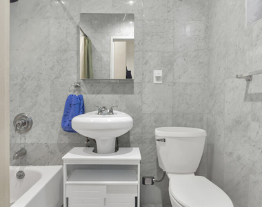 233 E 12th Street - Photo Thumbnail 3