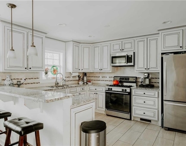 1496 Woodland Avenue Se - Photo Thumbnail 1