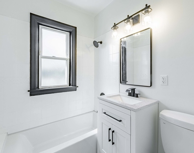 7614 W 63rd Place - Photo Thumbnail 6