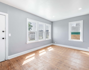 7614 W 63rd Place - Photo Thumbnail 2