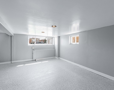 7614 W 63rd Place - Photo Thumbnail 10