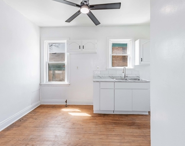 7614 W 63rd Place - Photo Thumbnail 7