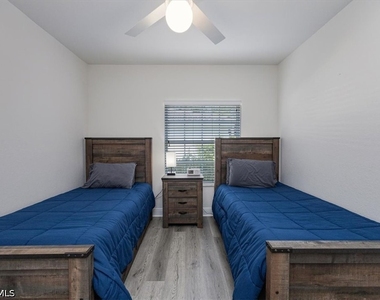 6914 Satinleaf Road N - Photo Thumbnail 16