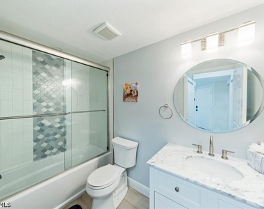 6914 Satinleaf Road N - Photo Thumbnail 18